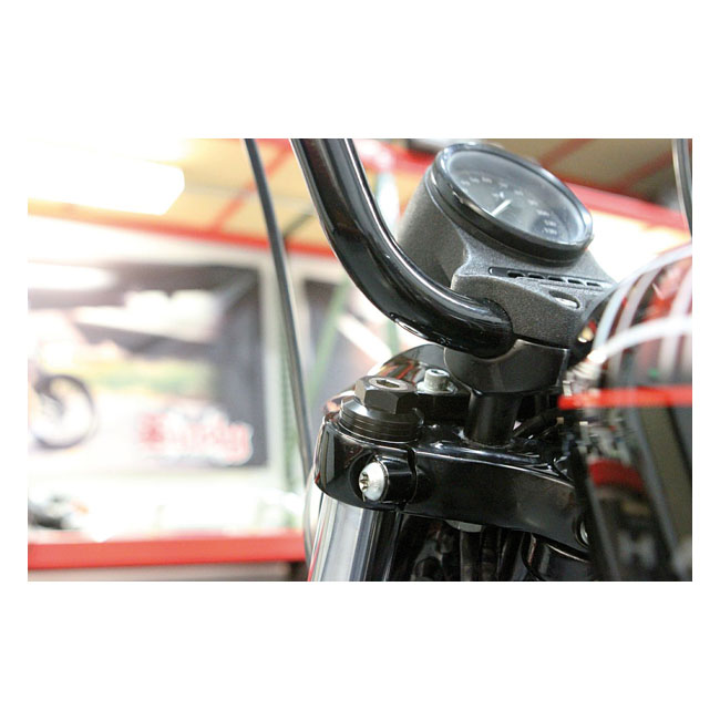 Burly, 39mm fork spring preload adjusters. Black anodized